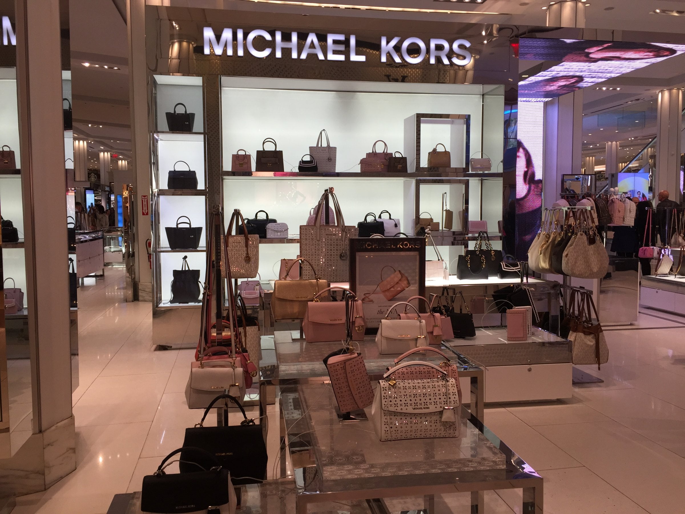 Michael Kors Holdings to close stores as sales lag