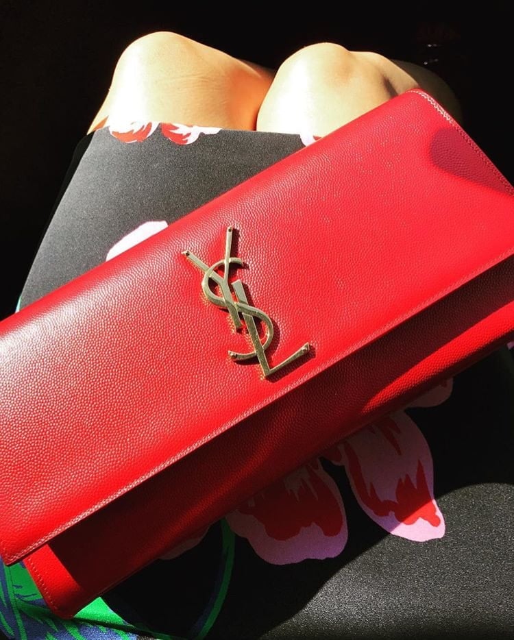 red designer clutch bag
