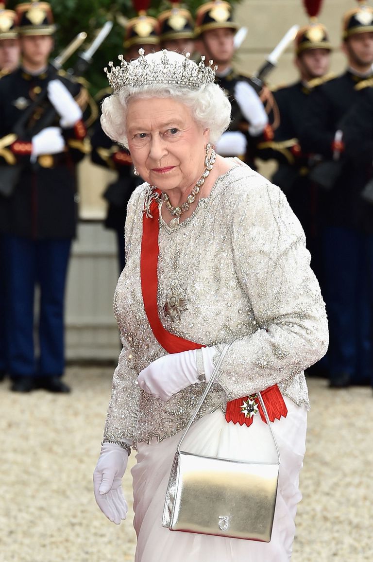 Queen Elizabeth's handbag: what she keeps inside the purse that featured in  the Paddington sketch | HELLO!