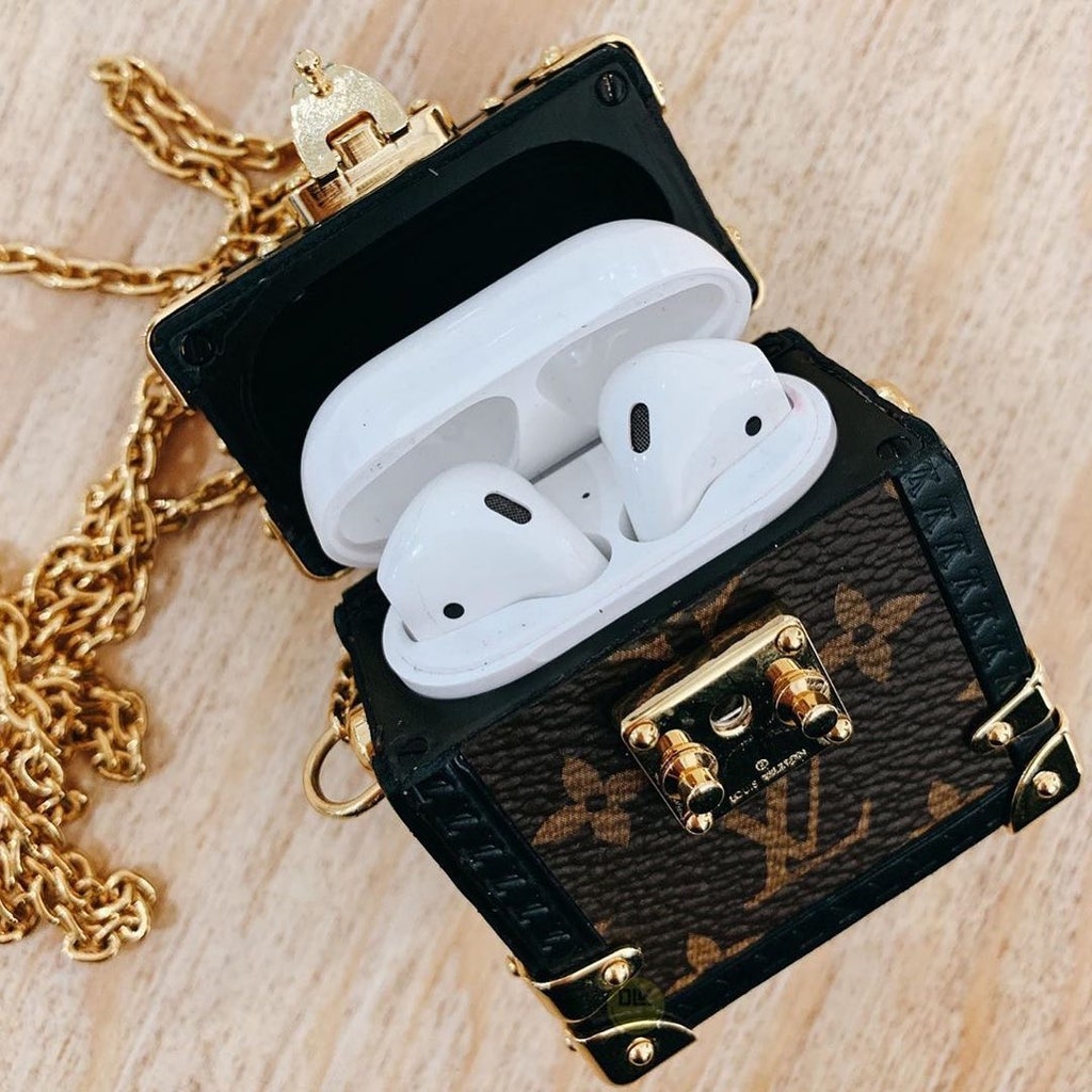The cutest chanel perfume inspired AirPod case ever! I'm in love with it  😍😍😍