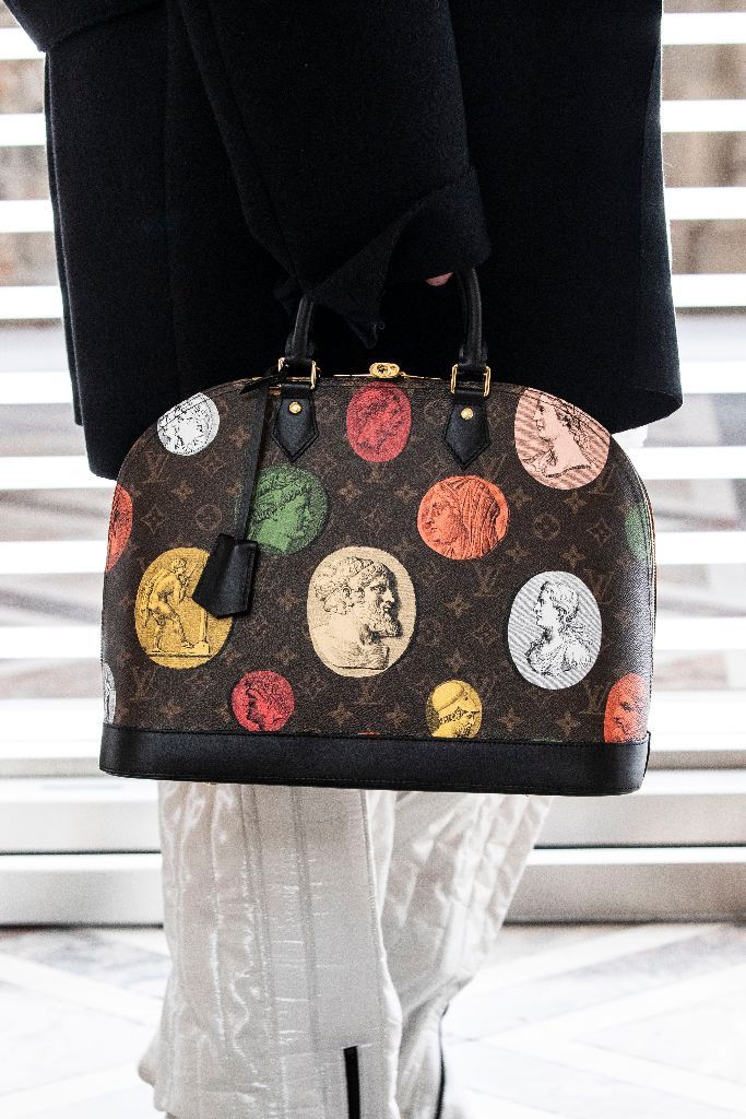 Louis Vuitton: Fornasetti in the Louvre for fall 2021