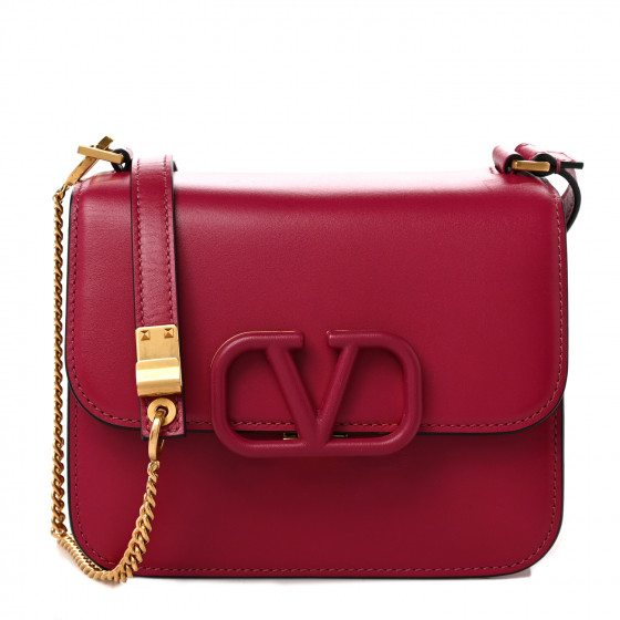 Valentino Pink Handbag worn by Tanya McQuoid (Jennifer Coolidge) as seen in  The White Lotus TV series wardrobe (Season 2)