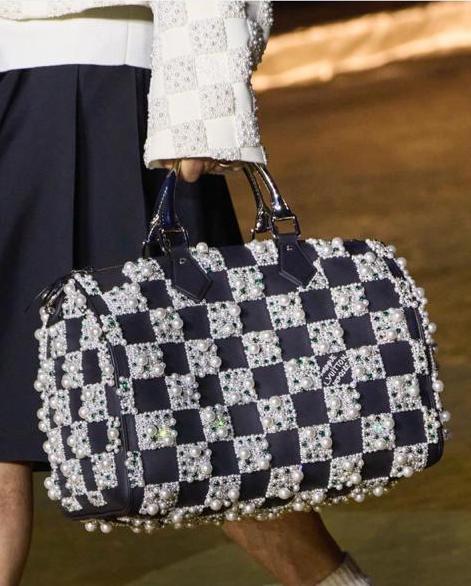 The Louis Vuitton Millionaire Speedy 40 handbag from Pharrell's Spring 24  menswear collection made out of 100% crocodile leather, real…